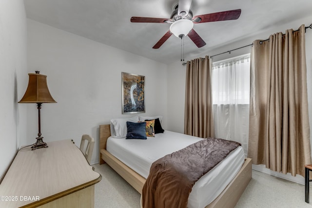 1713 Caldwell Rd, South Daytona, FL 32119 - bedroom featuring ceiling fan and light colored carpet