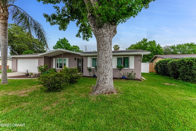 1713 Caldwell Rd, South Daytona, FL 32119 - ranch-style home featuring an attached garage and concrete driveway