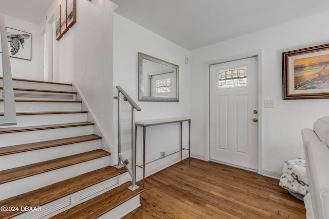 foyer entrance with light hardwood / wood-style flooring