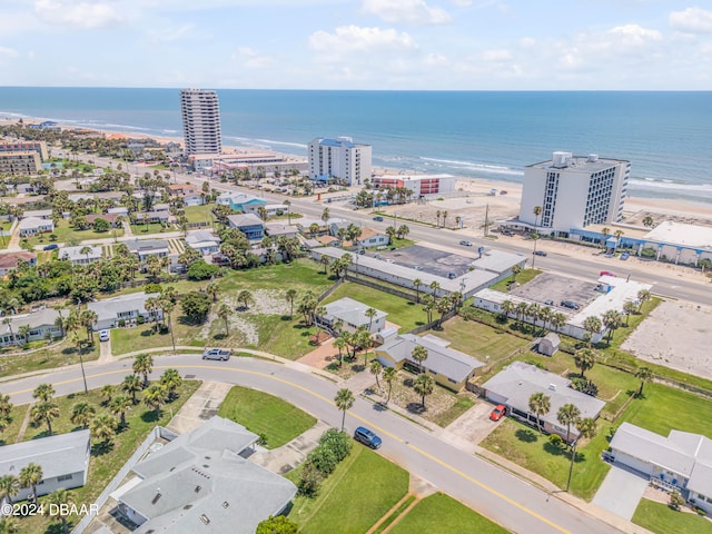 drone / aerial view with a view of the beach and a water view