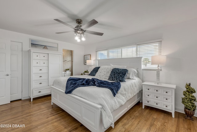 bedroom featuring light hardwood / wood-style floors and ceiling fan