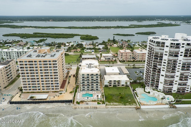 bird's eye view with a water view