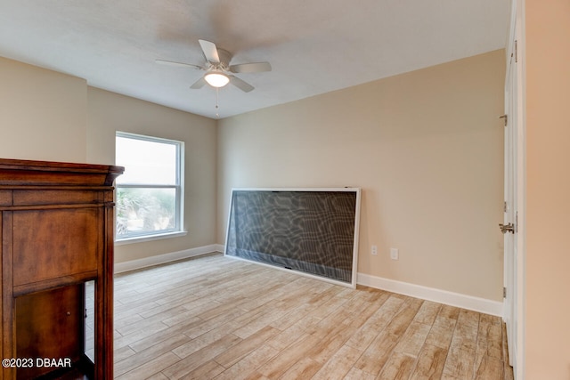 unfurnished bedroom with light hardwood / wood-style flooring and ceiling fan