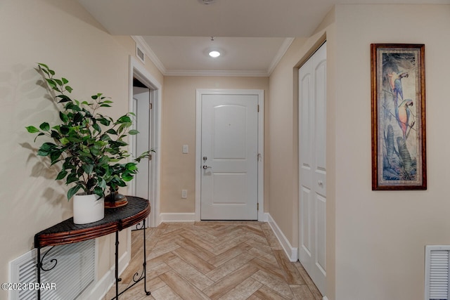 doorway to outside with light parquet flooring and ornamental molding