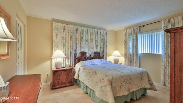 bedroom featuring light tile patterned flooring, a textured ceiling, a closet, and ornamental molding