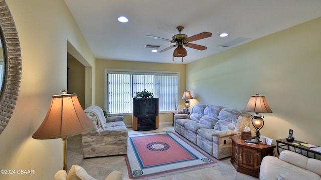 living room featuring ceiling fan