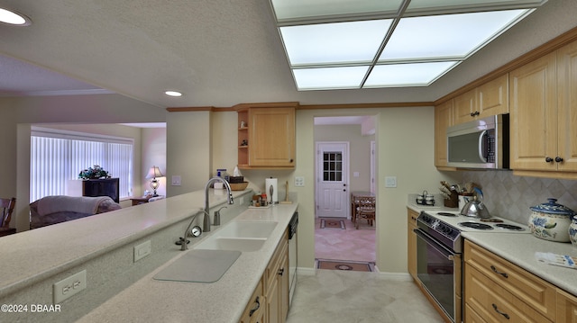 kitchen with tasteful backsplash, ornamental molding, stainless steel appliances, light brown cabinets, and sink