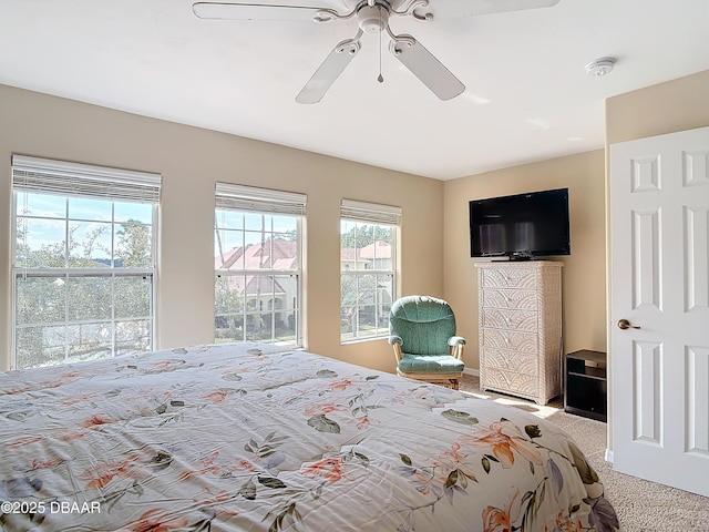 bedroom featuring a ceiling fan and carpet floors