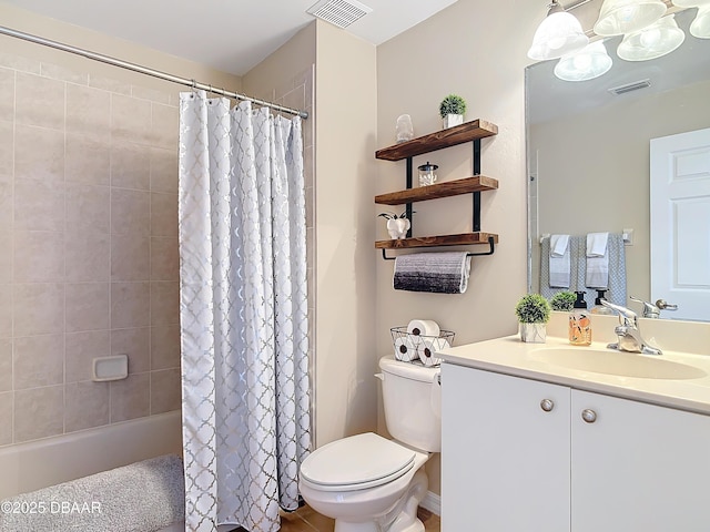 full bathroom featuring vanity, shower / bath combo, and toilet