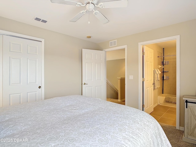 bedroom featuring ensuite bathroom and ceiling fan