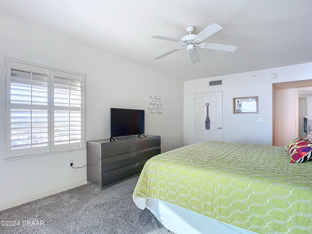 bedroom featuring carpet flooring and ceiling fan