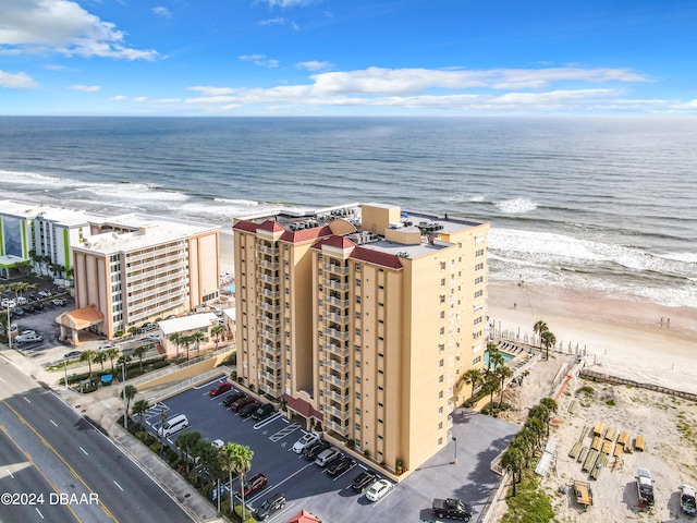 aerial view with a view of the beach and a water view