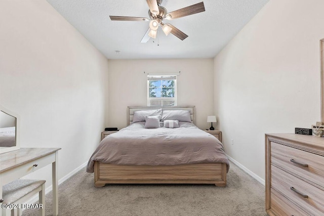 161 Tarracina Way, Daytona Beach, FL 32117 - bedroom featuring light colored carpet, baseboards, and ceiling fan