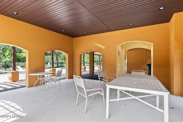 161 Tarracina Way, Daytona Beach, FL 32117 - view of patio / terrace with outdoor dining space, a swimming pool, and fence