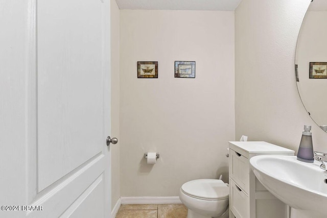 161 Tarracina Way, Daytona Beach, FL 32117 - half bath with a sink, toilet, tile patterned flooring, and baseboards