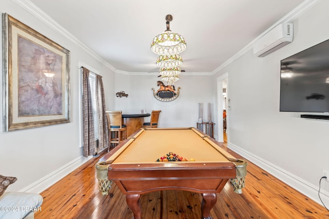 recreation room with ornamental molding, indoor bar, hardwood / wood-style flooring, an AC wall unit, and pool table