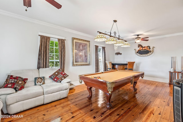 rec room featuring light wood-type flooring, ceiling fan, crown molding, and billiards