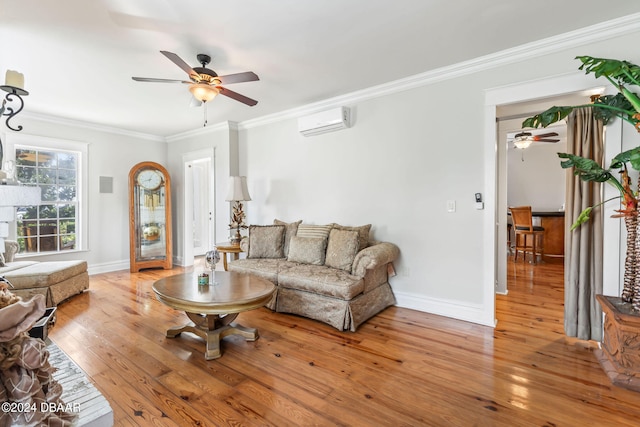 living room featuring ceiling fan, light hardwood / wood-style flooring, a wall mounted air conditioner, and ornamental molding