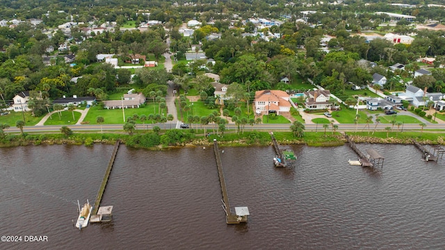 birds eye view of property featuring a water view