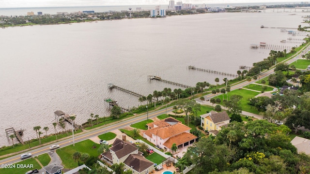 birds eye view of property featuring a water view