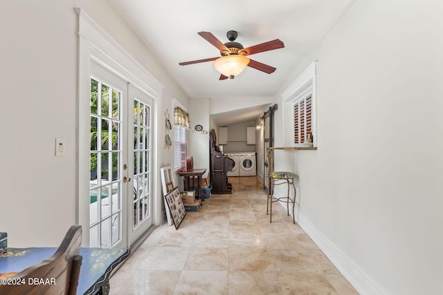 interior space featuring ceiling fan, washing machine and dryer, and french doors