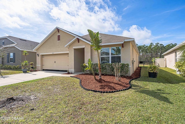 view of front of home featuring a garage and a front yard