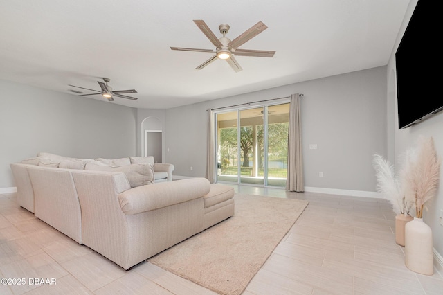 living room with ceiling fan