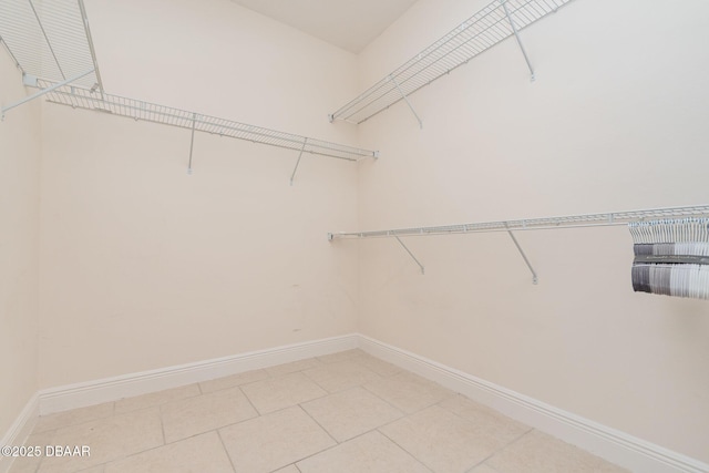 walk in closet featuring tile patterned floors