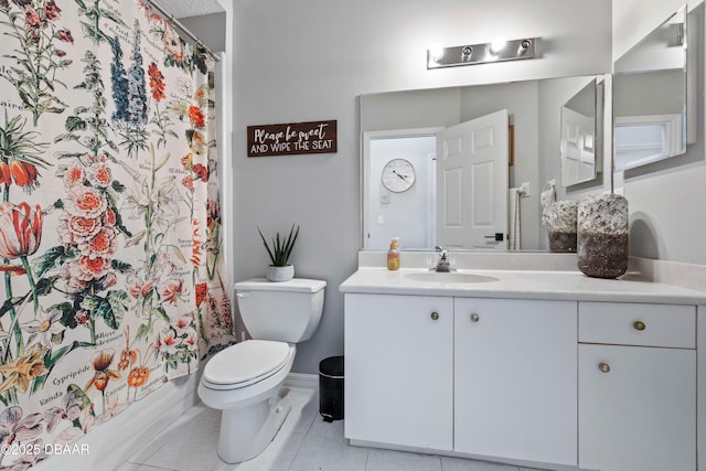 full bath featuring tile patterned flooring, vanity, and toilet