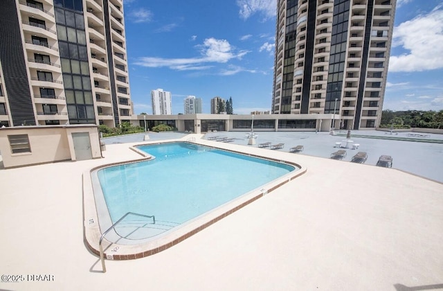 view of pool with a patio