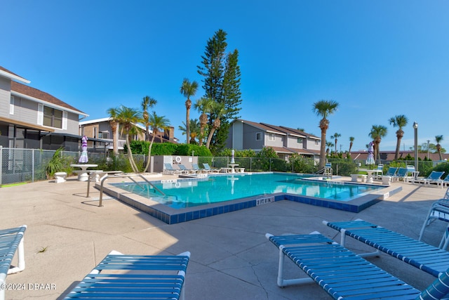 view of swimming pool featuring a patio