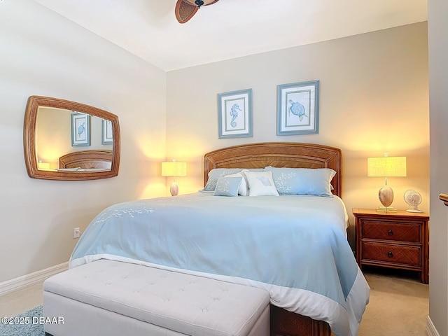 carpeted bedroom with baseboards