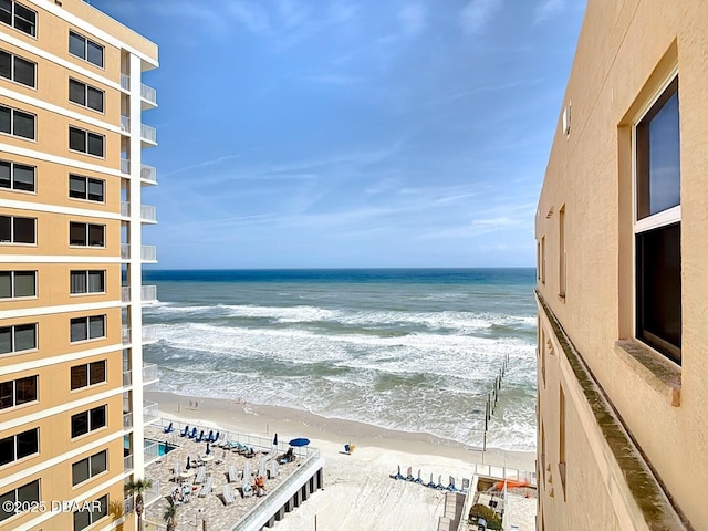 view of water feature with a beach view