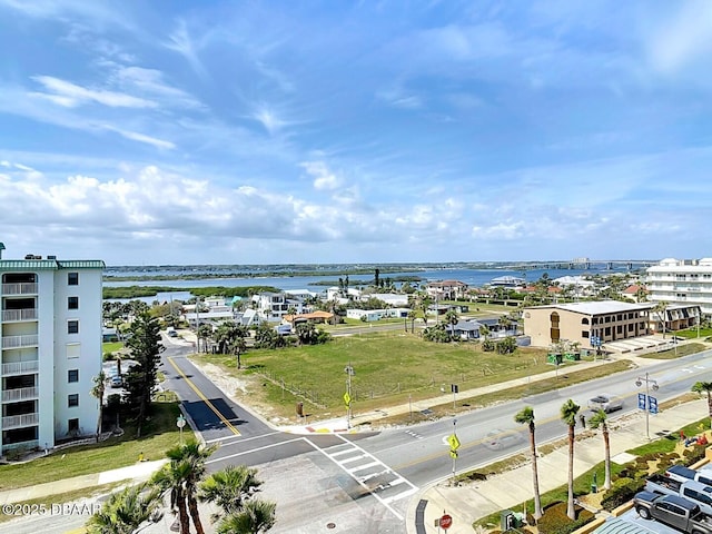 birds eye view of property featuring a water view