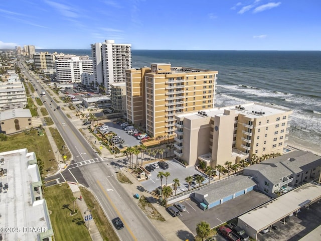 drone / aerial view with a water view and a city view