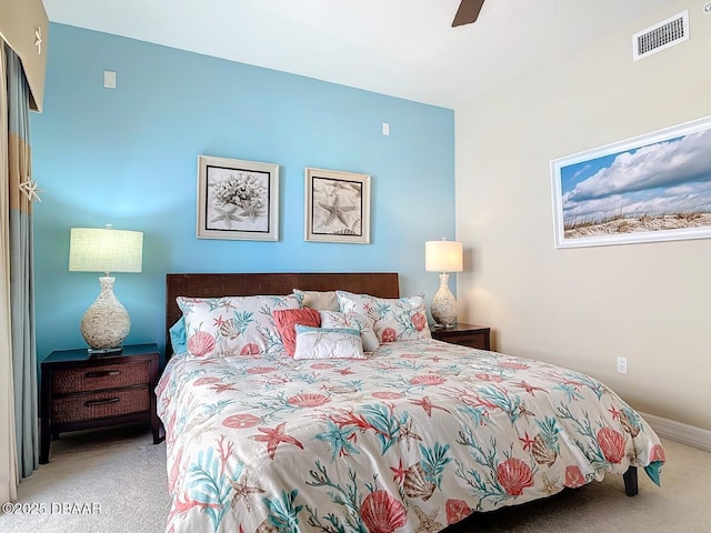 bedroom with carpet flooring, visible vents, and a ceiling fan