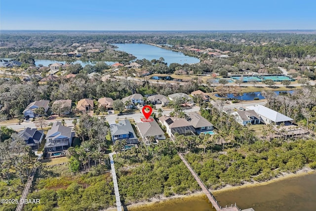 drone / aerial view with a water view