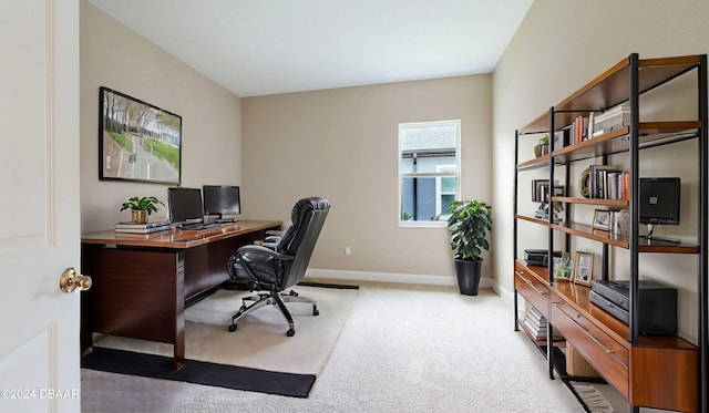 home office featuring light colored carpet