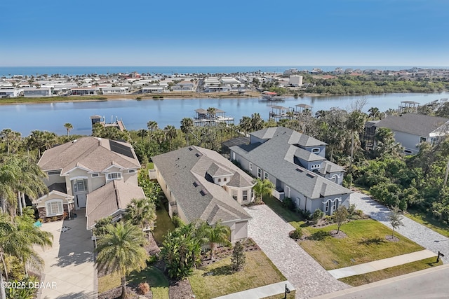 drone / aerial view with a water view