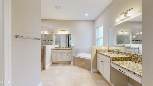 bathroom with plus walk in shower and vanity