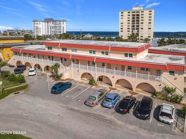 view of building exterior featuring a water view