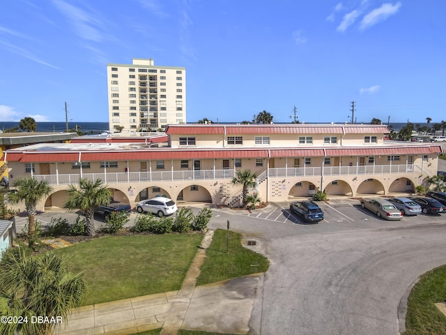 1510 Ocean Shore Blvd Unit 406, Ormond Beach, FL 32176 - view of property with uncovered parking