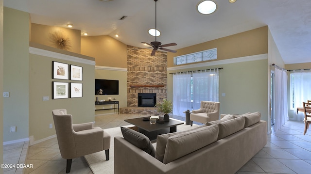 tiled living room with a fireplace, high vaulted ceiling, and ceiling fan