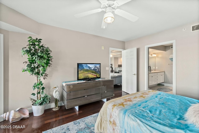 bedroom featuring ensuite bathroom, ceiling fan, and dark hardwood / wood-style flooring