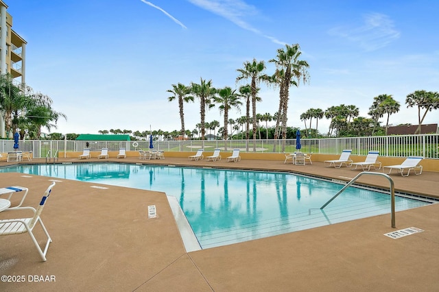 view of pool featuring a patio