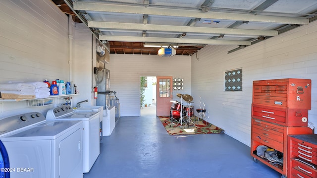 garage featuring independent washer and dryer