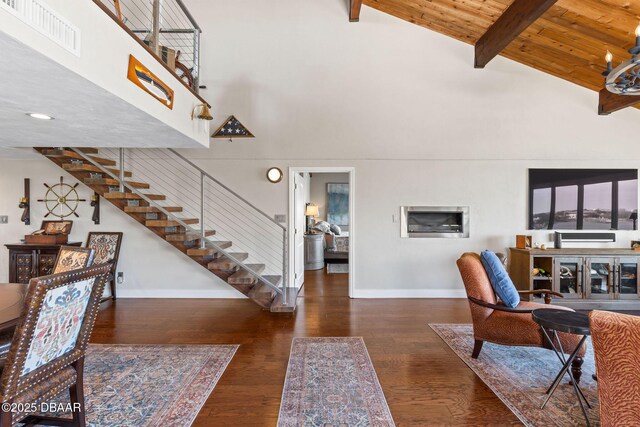 761 Marina Point Dr Unit 7610, Daytona Beach, FL 32114 - living area with high vaulted ceiling, beamed ceiling, visible vents, stairway, and wood finished floors