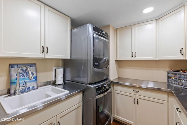 761 Marina Point Dr Unit 7610, Daytona Beach, FL 32114 - laundry area with recessed lighting, a sink, cabinet space, and stacked washer / drying machine