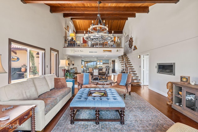 761 Marina Point Dr Unit 7610, Daytona Beach, FL 32114 - living room featuring a chandelier, wood ceiling, beam ceiling, and stairway