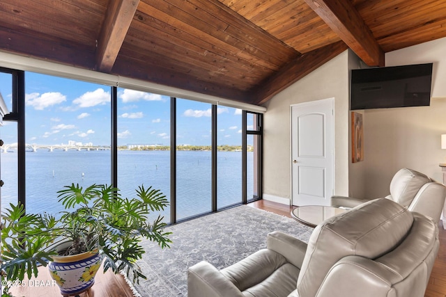 761 Marina Point Dr Unit 7610, Daytona Beach, FL 32114 - living room with a water view, wood finished floors, wooden ceiling, and lofted ceiling with beams